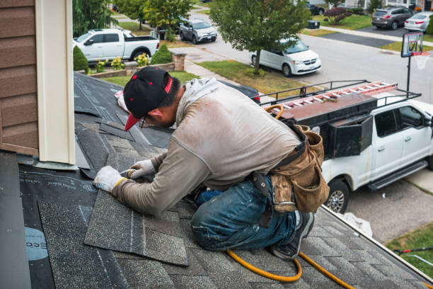 Professional Roofing technician working in Fort Myers Beach, FL